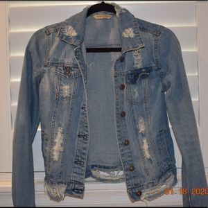 ripped denim jacket